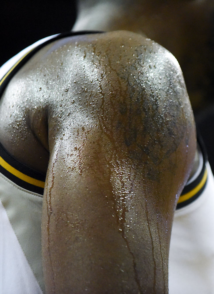 Jeremiah Tilmon's shoulder glistens with sweat during the second half